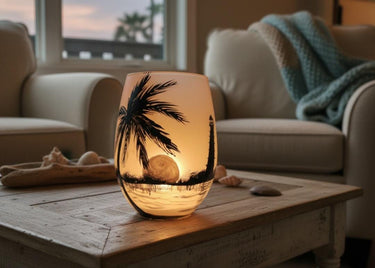 Sunset in the sea palm tree and lighthouse