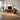 Natural Wood TV Console with Angled Frame and Open Storage Shelves