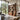 Tall Solid Wood Bookshelf With Open Shelves And Sculptural Curved Side