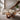 Round Wood Coffee Table with Interlocking Sculptural Loop Base