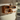 Curved Wall Mounted Shelf with Integrated Storage Compartments