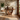 Carved Wood Console Table With Flowing Base for Soft Minimalism