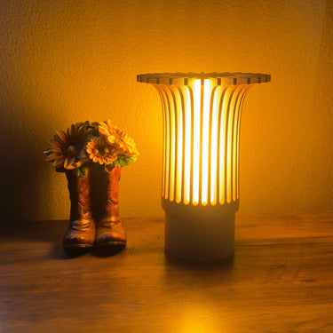 Modern architectural table lamp, sculptural ambient light, ribbed column design, minimalistic home decor, inspired by Selling