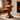 Sculpted Pedestal Accent Table in Natural Wood